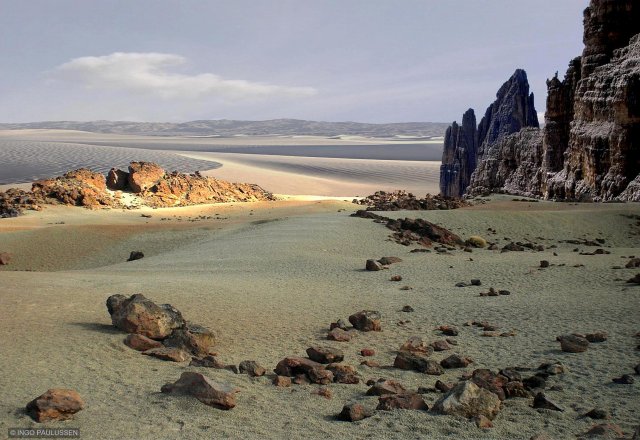 Mars oder Erde? Auf beiden Planeten begegnet man diesen Landschaftsformen. Zerfallende Ebenenreste überragen ein Meer aus Sand